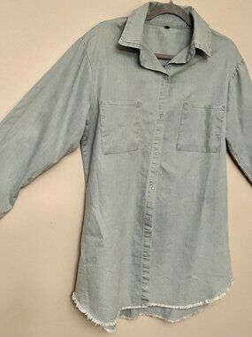 Lightweight denim boho tunic with fringe details and front pocket